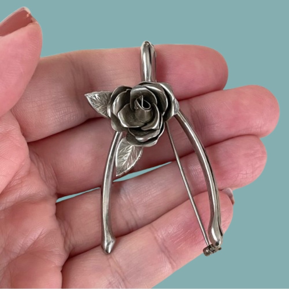 Vintage silvertone Coro wishbone & rose brooch